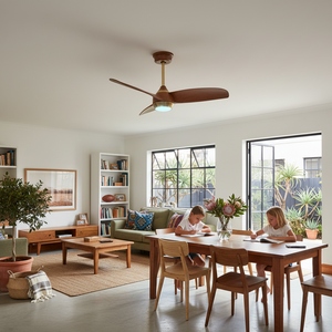 Stylish living room featuring the Gold/Walnut LED ceiling fan, with children drawing at a wooden table.