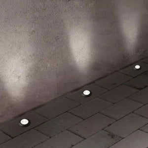 Aldo recessed ground lights installed in an outdoor pathway