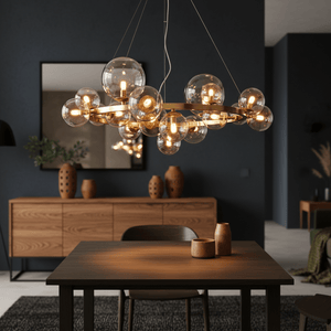 Stylish round pendant light with cognac glass bubbles above a wooden dining table in a modern setting.