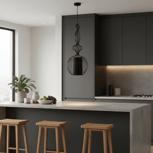 Tokyo 4 Black Wire Frame Pendant light hanging above a modern kitchen island with wooden stools.