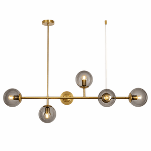 Modern chandelier with gold fixtures and clear glass shades on a white background