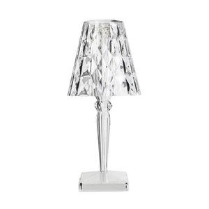 Acrylic rechargeable table lamp with a sleek black design, ideal for modern interiors.