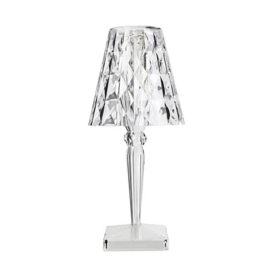 Acrylic rechargeable table lamp with a sleek black design, ideal for modern interiors.