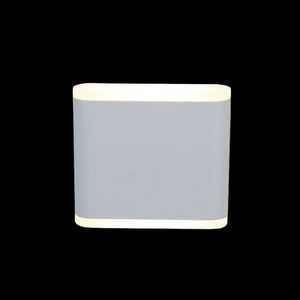 Rectangular light fixture with a gray body and white trim on a black background