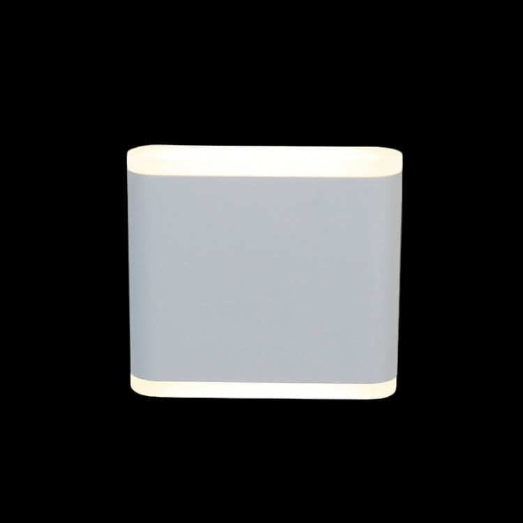 Rectangular light fixture with a gray body and white trim on a black background