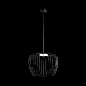 Black wire pendant light with cage-like shade hanging against black background