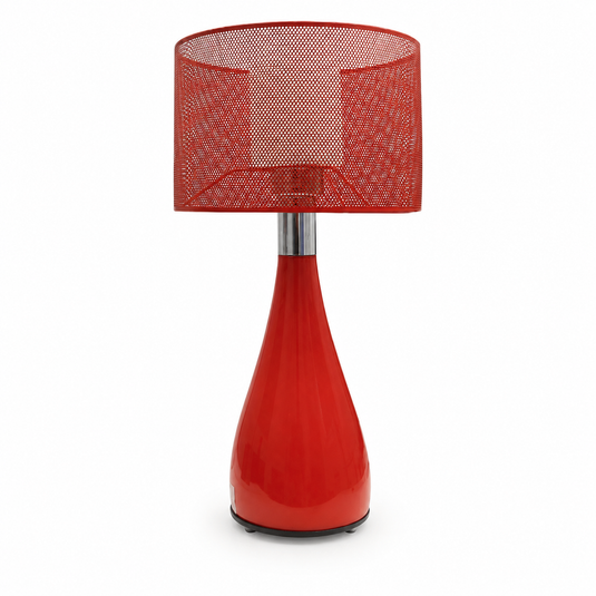 Red table lamp with a mesh shade on a white background