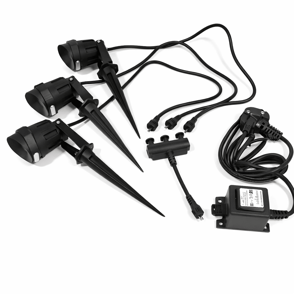 Set of black outdoor lighting fixtures with wiring on a white background