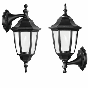Black outdoor wall light with clear panels, designed for upward or downward mounting.