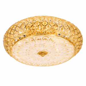 Gold ceiling light fixture with intricate design on a white background