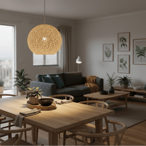 Natural twine cover pendant light hanging above a wooden dining table, creating a warm ambiance in a cozy living space.