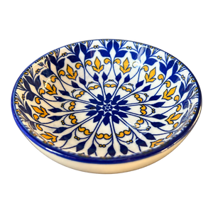 Ceramic flat bowl with blue and yellow mandala, transparent background