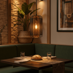 Boston Metal Pendant Light in a cozy dining setting, illuminating a table with bread and glasses.