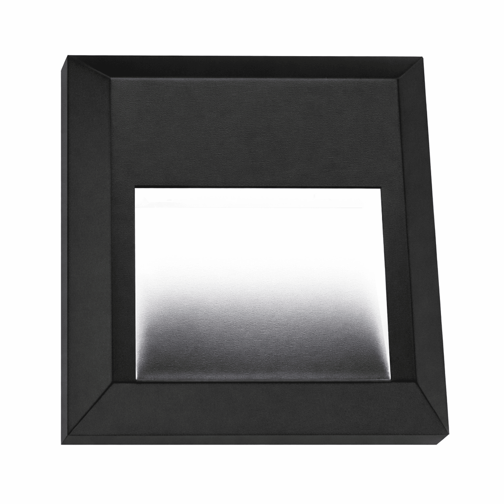 Close-up view of a sleek black LED foot light with a frosted lens, designed for stylish stairway lighting.
