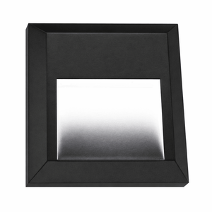 Close-up view of a sleek black LED foot light with a frosted lens, designed for stylish stairway lighting.