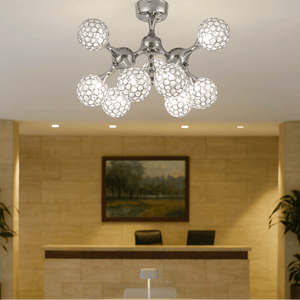 Modern chandelier in a room with a painting on the wall