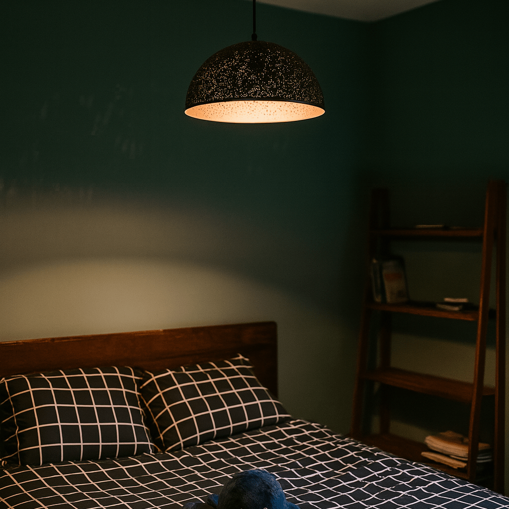 Bedroom with a bed, lamp, and bookshelf in a dimly lit room.