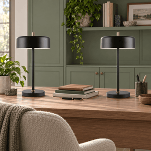 Pair of Diaz black table lamps on a home office desk