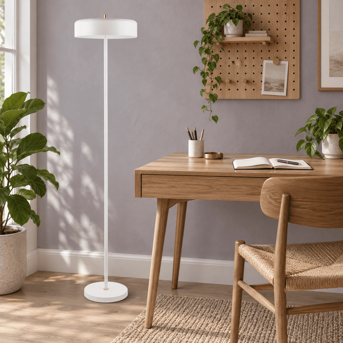Diaz white floor lamp beside a home office desk
