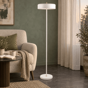 Diaz white floor lamp in a mineral green reading corner
