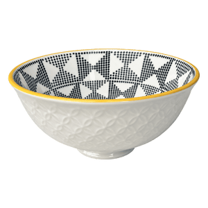 White ceramic bowl with raised exterior pattern, yellow rim and black geometric interior