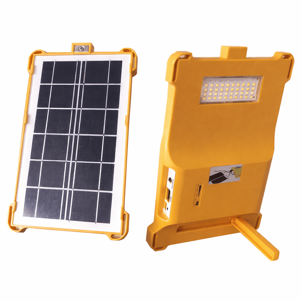 Solar panel and LED light fixture on a white background