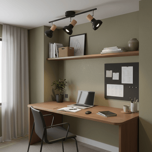 3 light spotlight mounted above a modern desk in a home office, illuminating workspace with adjustable heads.