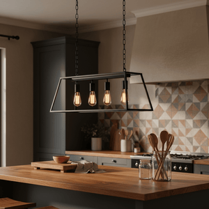 Rustic rectangular lantern pendant light with four bulbs hanging over a wooden kitchen island.