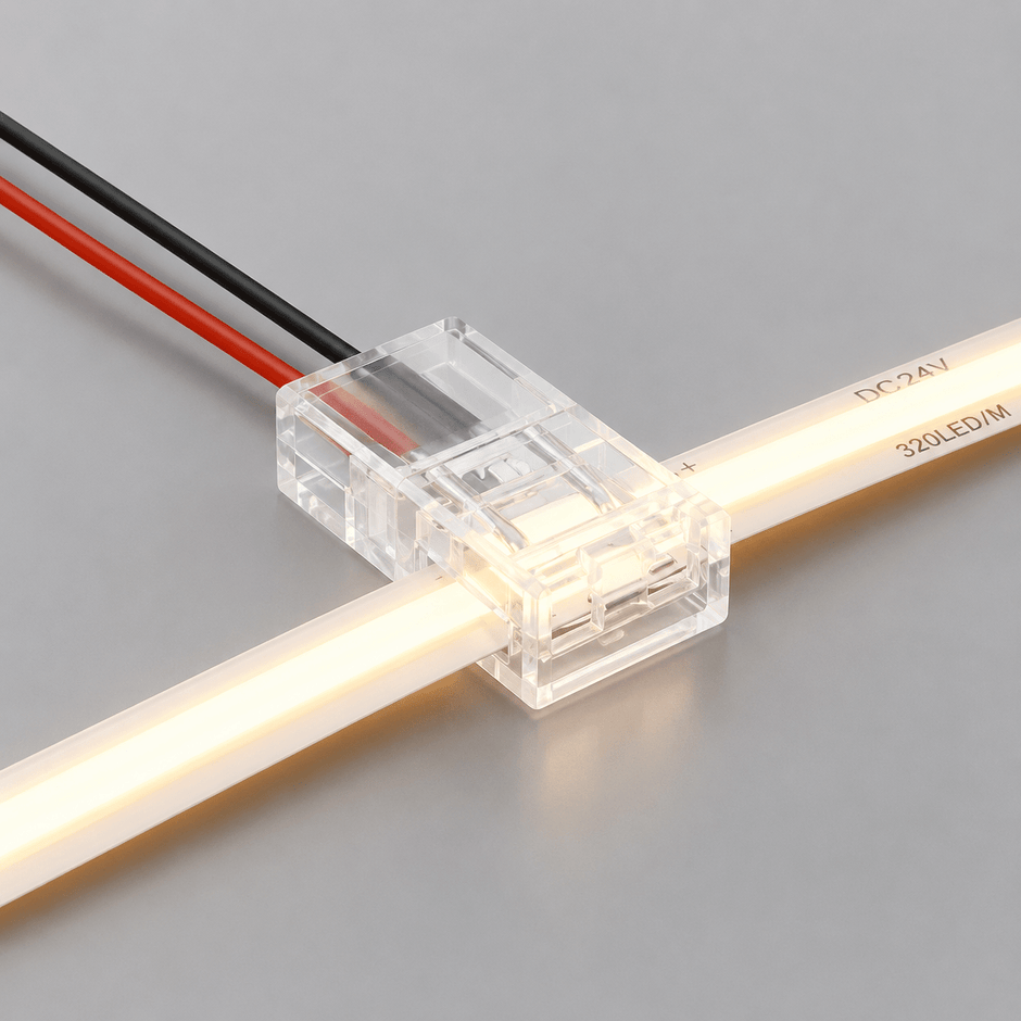 Hands clipping a seamless LED strip connector for installations into place ensuring even lumens for a South African under-counter setup