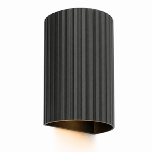 Black cylindrical wall light fixture on a white background