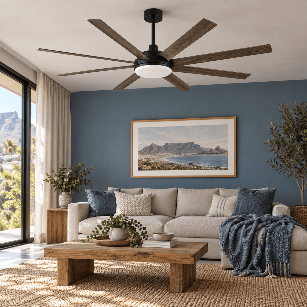 Eight blade ceiling fan in a living room with a dusty blue wall