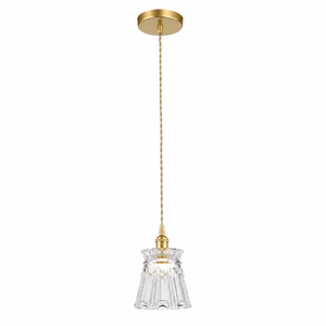 A gold ceiling mount supports a twisted cord leading to a fluted clear glass pendant light.