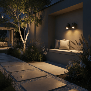 Double adjustable outdoor spot light mounted on wall illuminating garden bench and pathway