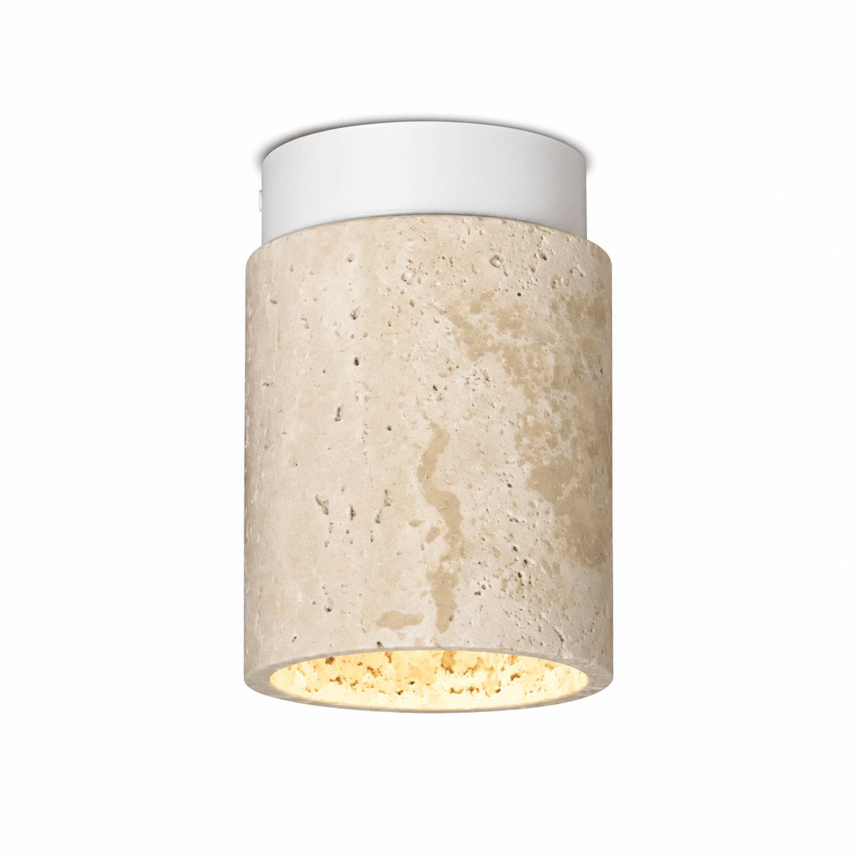 Close-up of a travertine marble downlight holder showcasing its elegant design and warm glow.