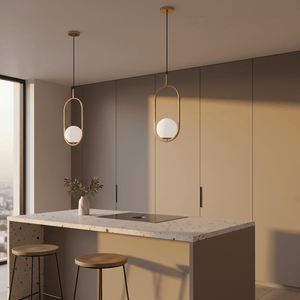 Two Luna Short G9 Pendant Lights hang over a modern kitchen island with a textured countertop and wooden stools.
