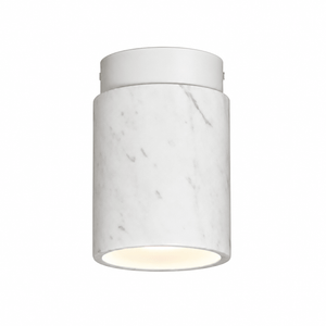 Close-up view of a white marble downlight holder with a sleek metal top, showcasing its elegant design.