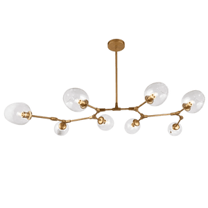 Elegant gold pendant light with eight glass globes, arranged asymmetrically on slender arms.