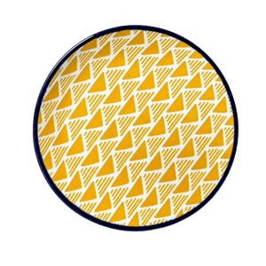 Ceramic flat bowl featuring a white interior with orange triangle patterns and a dark blue rim.