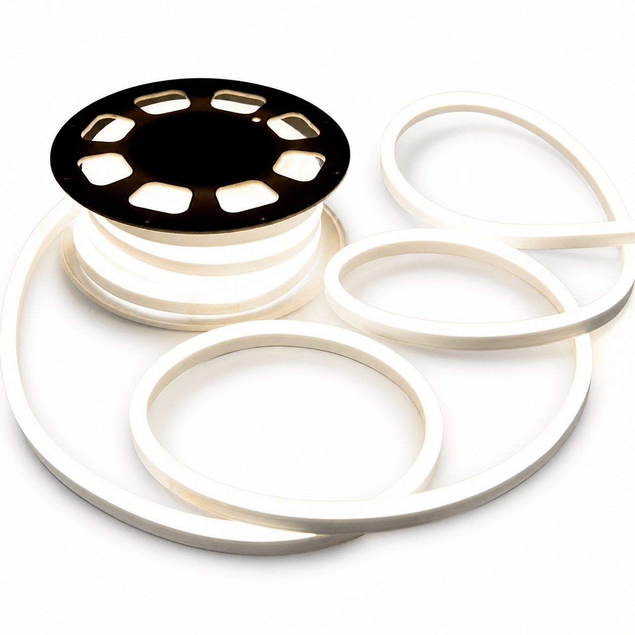 LED 24V Neon Flex Strip in warm white, coiled on a black reel, showcasing its flexible design.