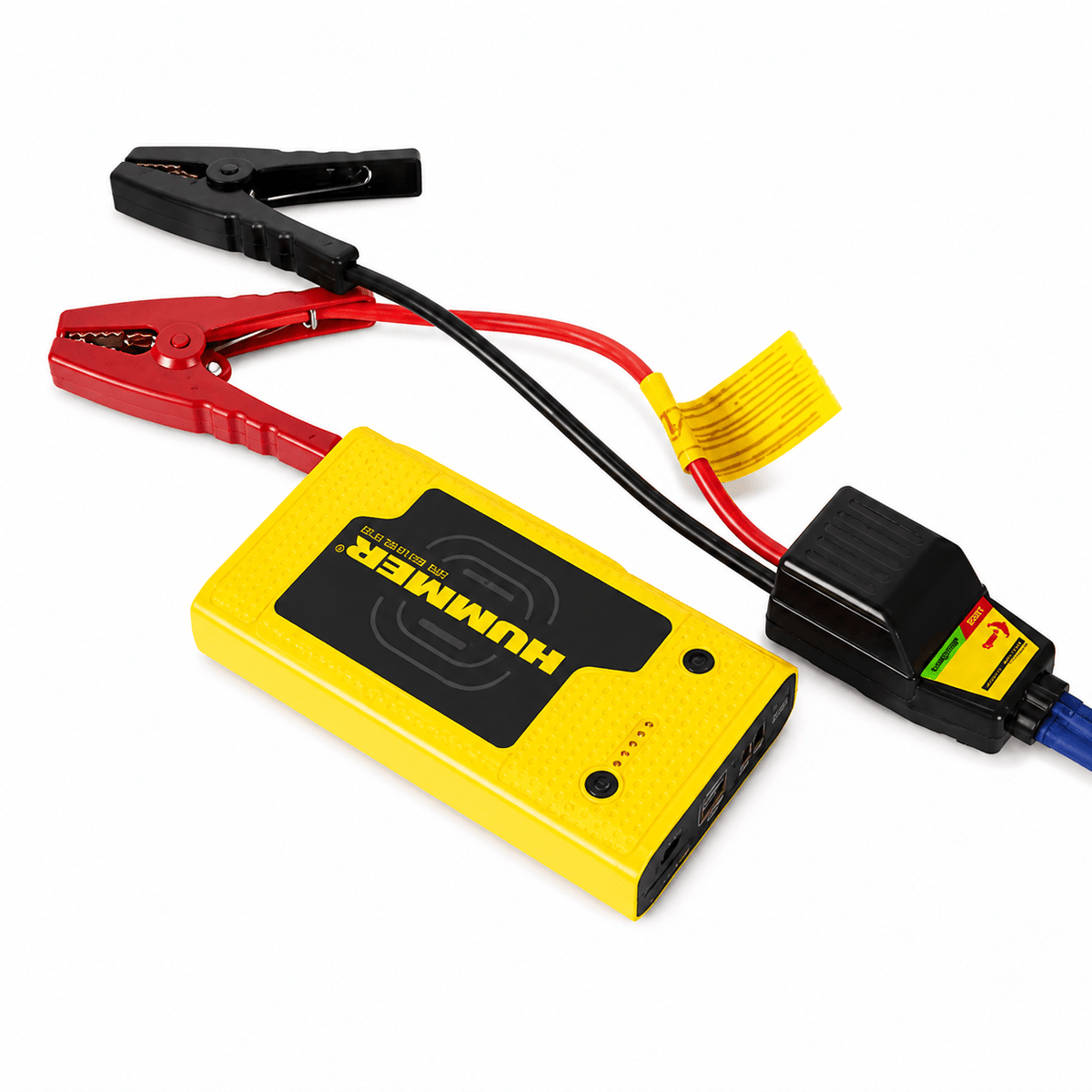 Hummer HX Pro 12V jump starter with red and black clamps connected, showcasing its compact design.