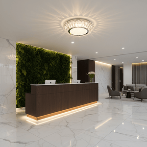 Modern reception area featuring a sunflower K9 crystal ceiling light above a sleek wooden counter with greenery.