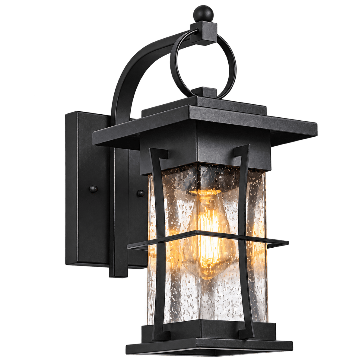 Black iron lantern with clear speckled glass, black metal bars, lit bulb, mounted on wall