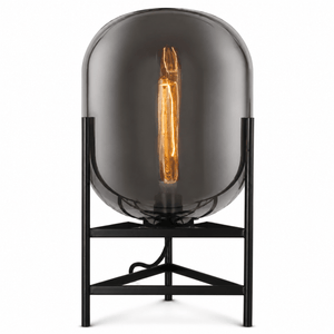 Bathurst Smoke Grey Table Lamp featuring a smoky-grey glass shade and modern black metal base.