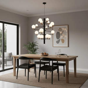 Stylish dining area featuring the TwentyOrb Black Pendant Light above a wooden table with black chairs.