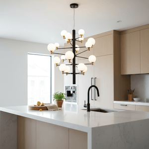 Modern kitchen featuring the TwentyOrb Black Pendant Light above a marble countertop with a plant and fruit.