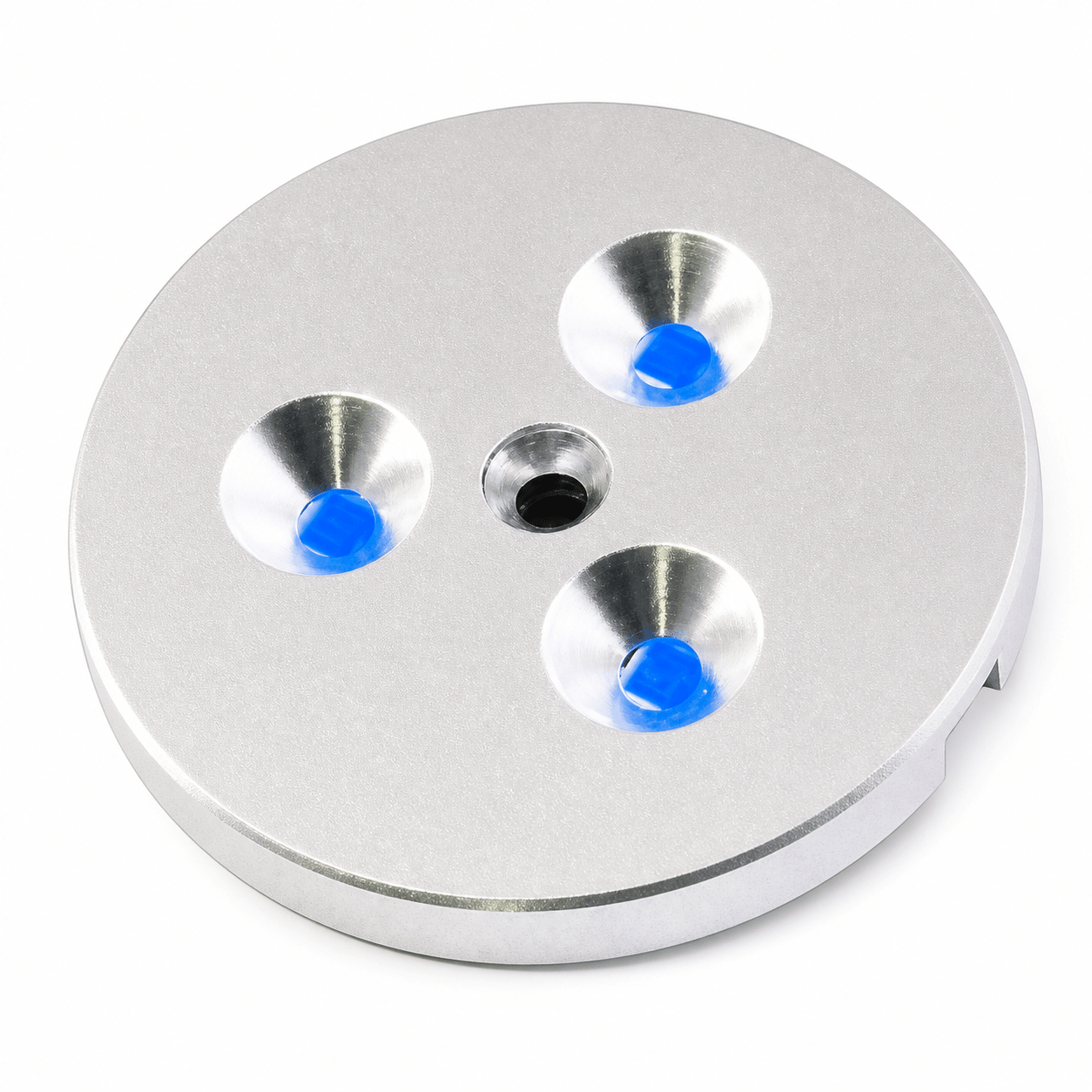 Three puck lights with blue lenses on a silver circular base