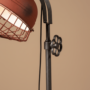 Close-up of the Rustic Urban Forge Floor Lamp showcasing the rustic red shade and industrial wire detail.