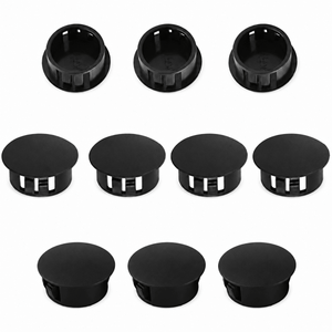 Ten 13mm black plastic hole plugs arranged in two rows, showcasing their design and functionality.