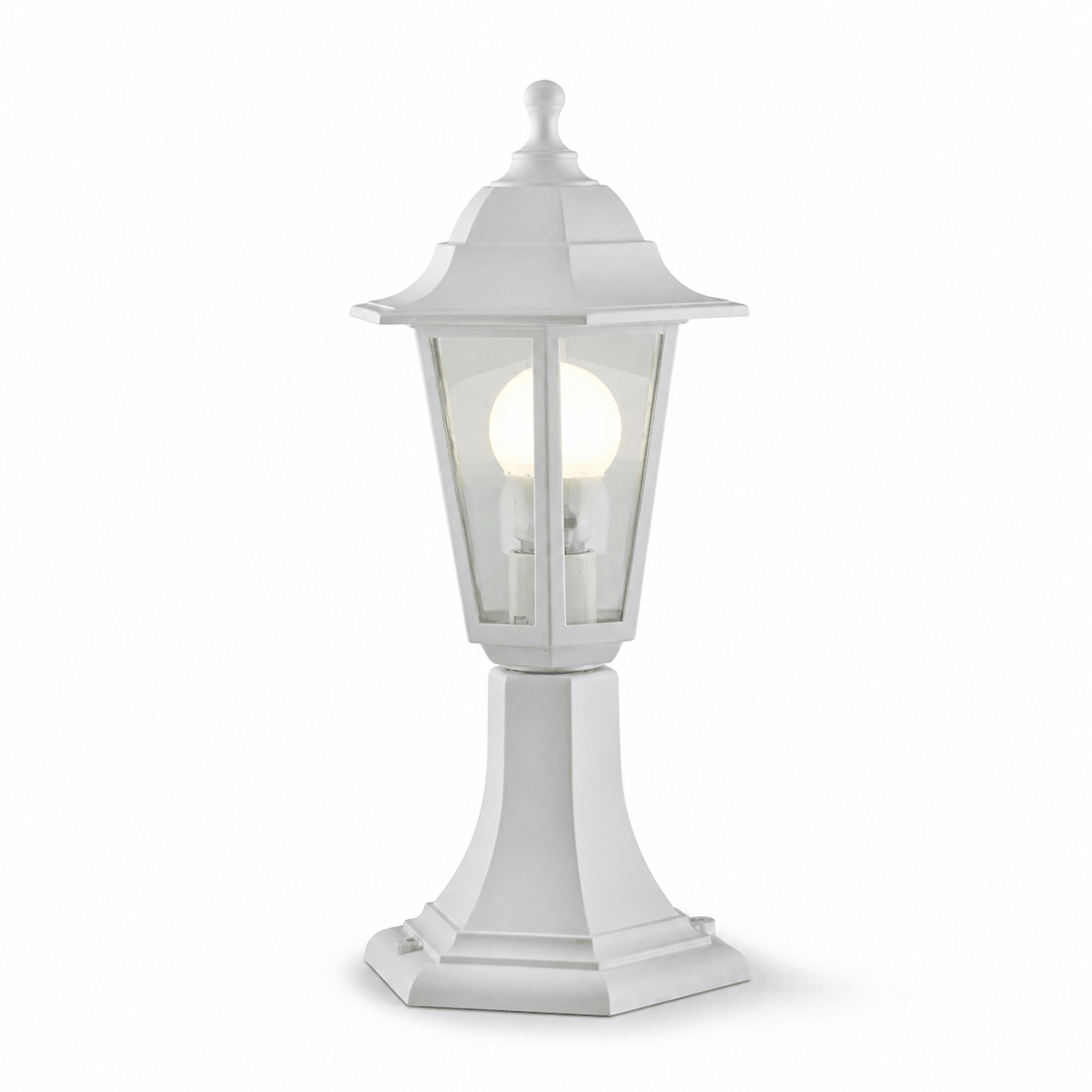 White six-panel pedestal lantern with clear panels and a bulb, showcasing a classic outdoor lighting design.