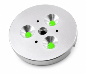 Three LED puck lights in green, featuring a sleek silver housing with a circular design.